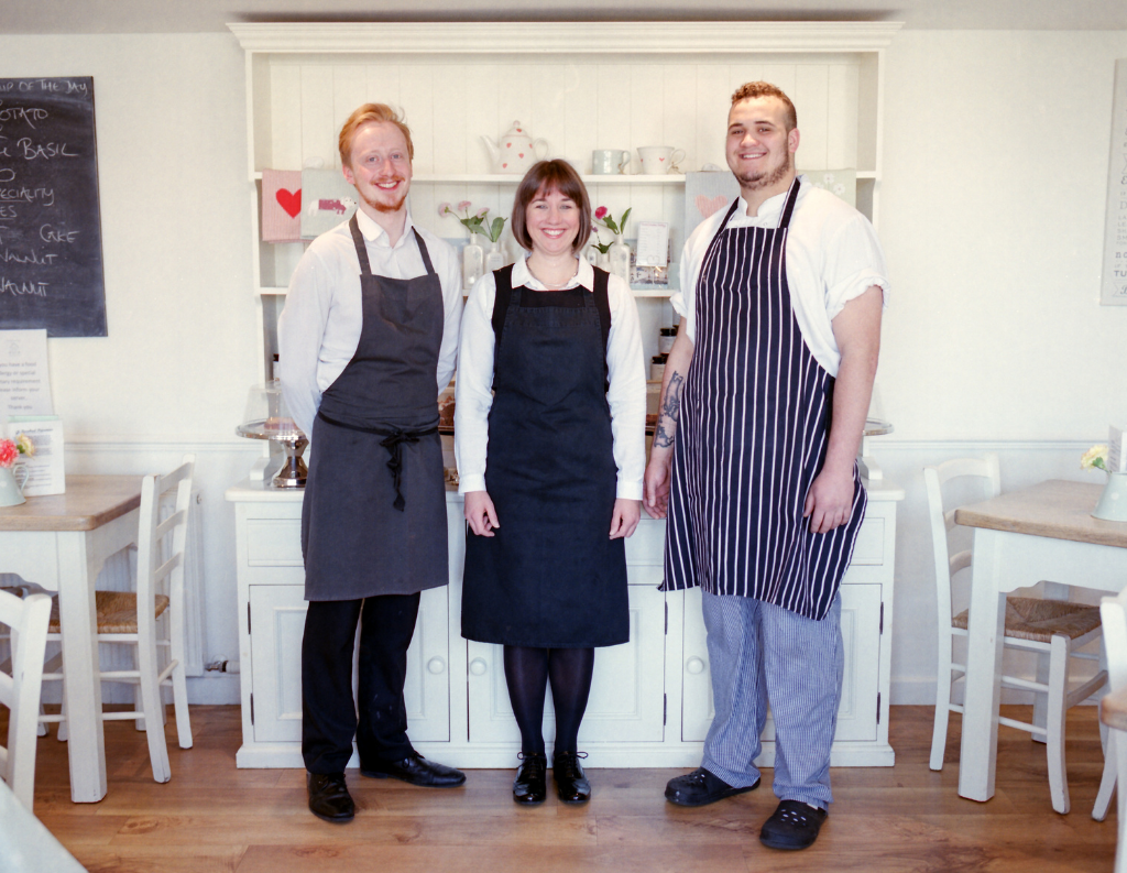 Image of 3 people having completed social media training.